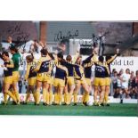 LEEDS UNITED AUTOGRAPHS 1981 Autographed 12 x 8 colour photo of players saluting fans at the Vetch