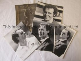 PRESS PHOTOS / FRANZ BECKENBAUER Five B/W photos with stamps on the reverse, four 8.5" X 6.5" and