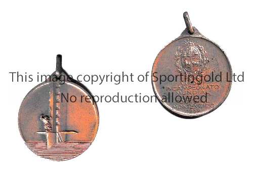 1930 FIFA WORLD CUP URUGUAY Original commemorative medal in original wrapper. One side has the tower