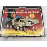 A boxed vintage Star Wars Millenium Falcon with mi