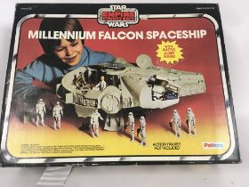 A boxed vintage Star Wars Millenium Falcon with mi