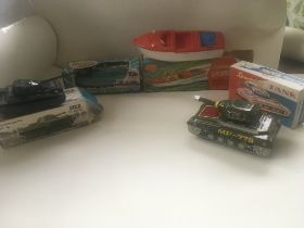 Collection of four boxed toys in the original pack