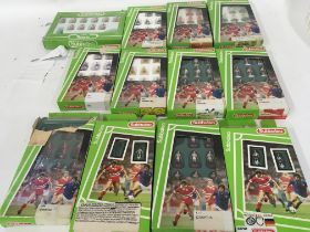 A collection of 12 boxed Subbuteo football teams