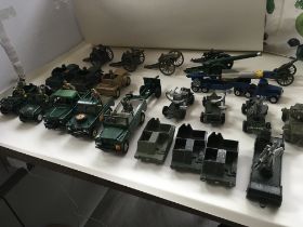 A collection of 24 Playworn diecast model military