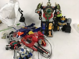 A collection of power ranger megazoid toys plus ot