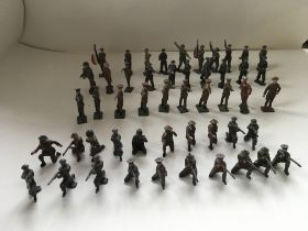 A collection of 50 metal soldiers by Britains and