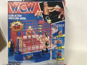 Two boxed games including WCW Slam Action Wrestling Arena. Also HeroQuest board game by MB games.