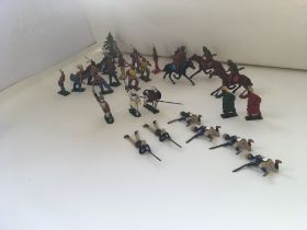 A collection of lead figures mainly by Britains lt