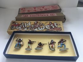 A collection of four sets of metal figures 3 by Br