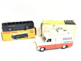 A Boxed Dinky Toys B.O.A.C Coach #283 and a Police