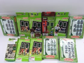 A Collection of 11 Boxed Subbuteo Teams.