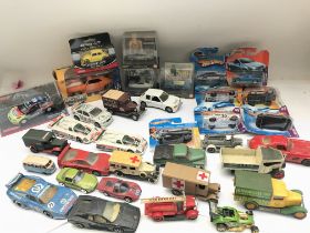 A Box Containing Various Playworn Diecast and Card