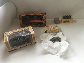 A collection of model toys in original packaging b