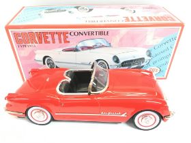 A Boxed Tin Friction powered Corvette Convertible