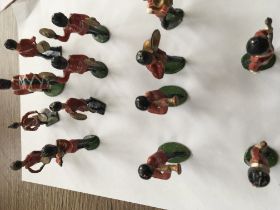 A collection of metal soldiers comprising a band,