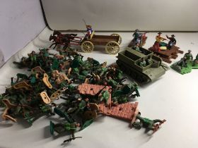 A collection of Timpo plastic figures and vehicles