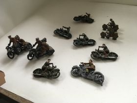 A great collection of metal soldiers with motorcyc