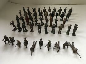 A collection of 50 metal soldiers mainly by Britai