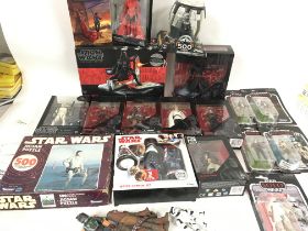 A collection of Star Wars boxed figures