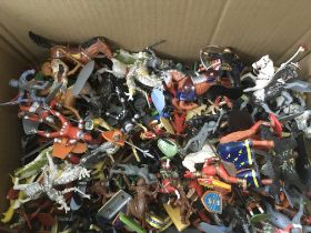 A box containing Playworn a large amount ofplastic