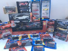 A Collection of Boxed Hot Wheels. Burago. Shell Fe
