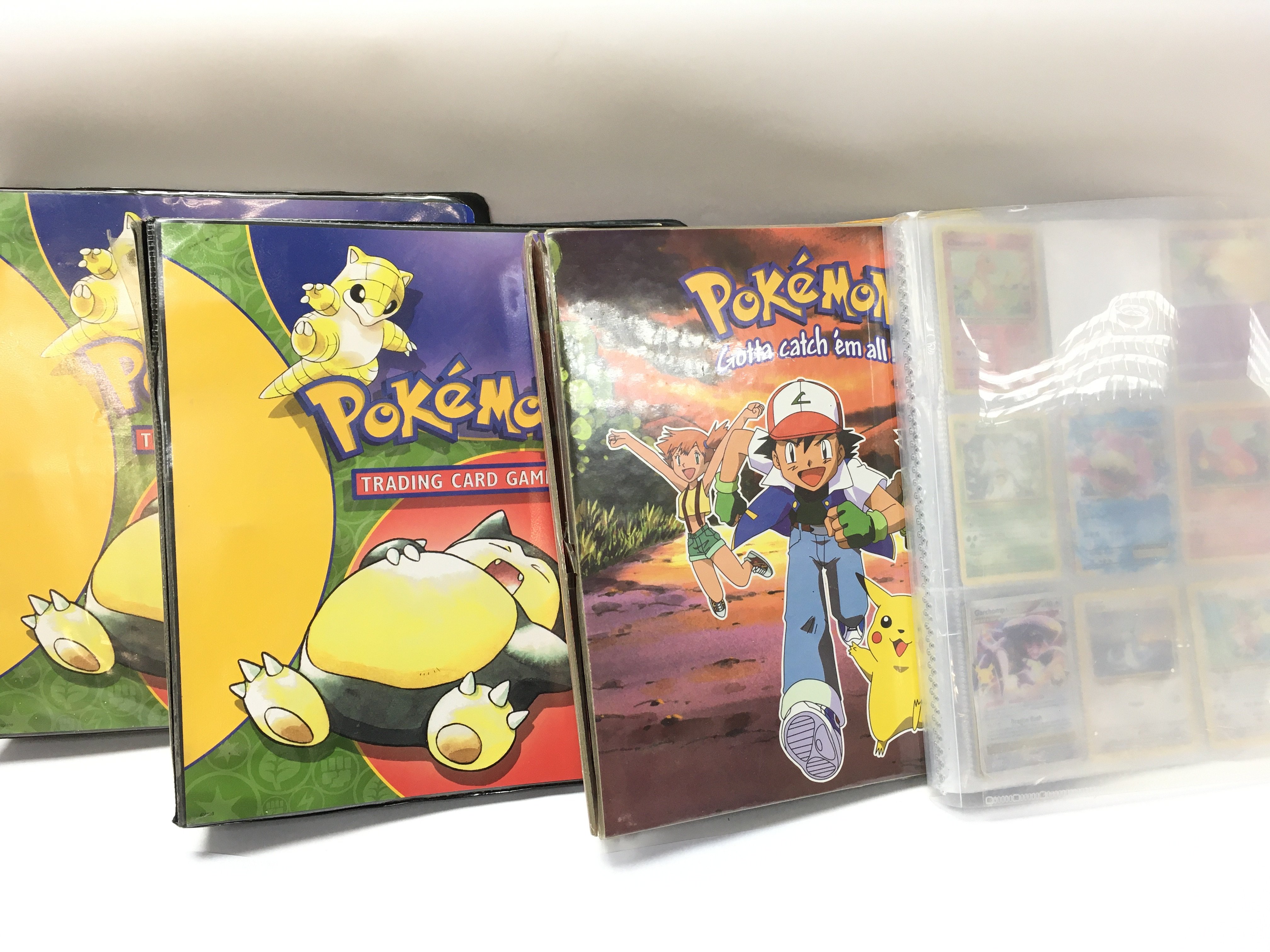 4 Binders Containing a Collection of vintage PokÃ©