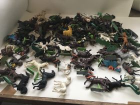 Box containing in excess of 100 plastic model hors