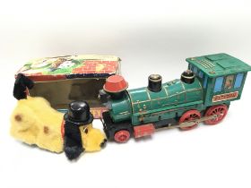 A Boxed Batterie Operated Sniffy Dog and a Casey Jones Train. NO RESERVE