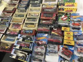 A collection in excess of 60 model cars by a varie