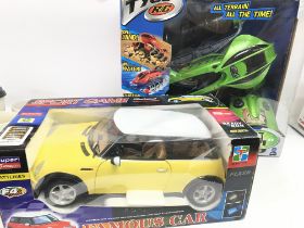A Boxed Tyco R/C Terrain Twister and a He Tai Toys R/C Mini.(2). NO RESERVE