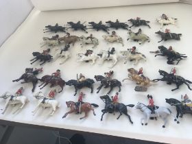 A collection of 30 metal mounted soldiers from dif