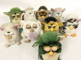 A collection of 9 Furbys.