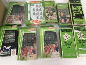 A collection of 10 boxed Subbuteo football teams