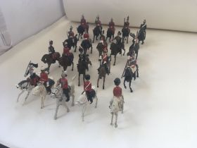 A collection 20 metal mounted soldiers of differin