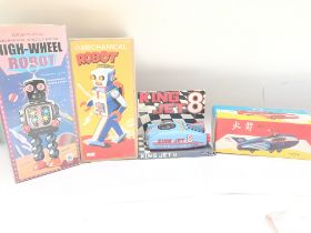 A Collection of Boxed Chinese Tin Plate Toys including a High-Wheel Robot. A Mechanical Robot. A