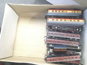 A Box containing in excess of forty loose coaches all 00 gauge. Mainly Hornby..Mainline and others.