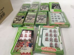 A collection of 10 boxed Subbuteo football teams