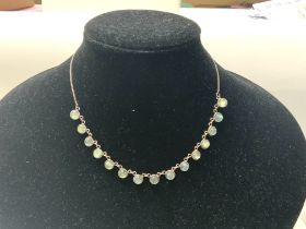 A sterling silver and labradorite set necklace.