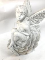 A stone fairy figure ornament, 42cm tall. Postage