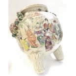A large Japanese satsuma urn decorated with figures and floral design. 36cm talk approximately. Some