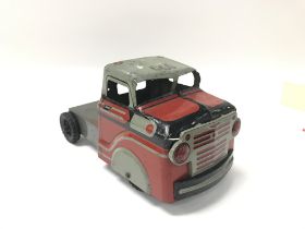 Toy truck with trailer add-on.