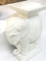 A porcelain elephant pedestal,48.5cm tall. Postage