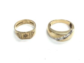 Two 9ct gold gents rings with diamonds. 9.34g