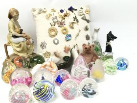 A Collection of paperweights, porcelain figures, a