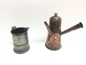 A pewter jug and a copper pot. No reserve.