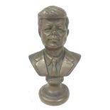 A bronze bust of American President John F. Kenned