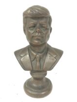 A bronze bust of American President John F. Kenned