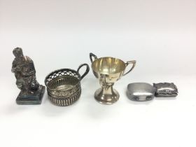 A collection of assorted silver items including pi