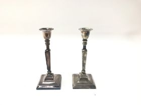 Pair of silver plated candlesticks.