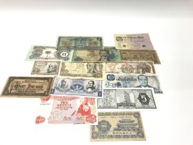 Small collection of foreign bank notes. (A)